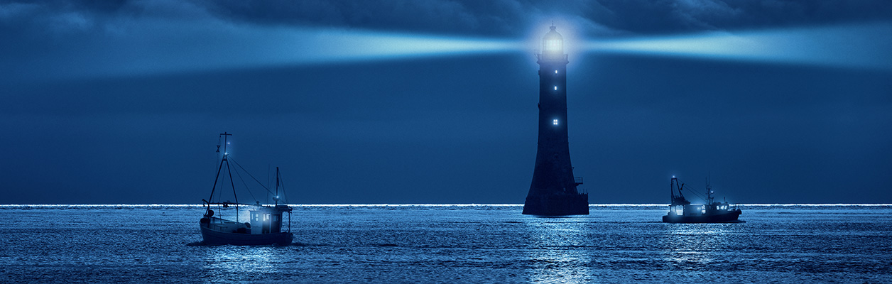 lighthouse and ships in the night